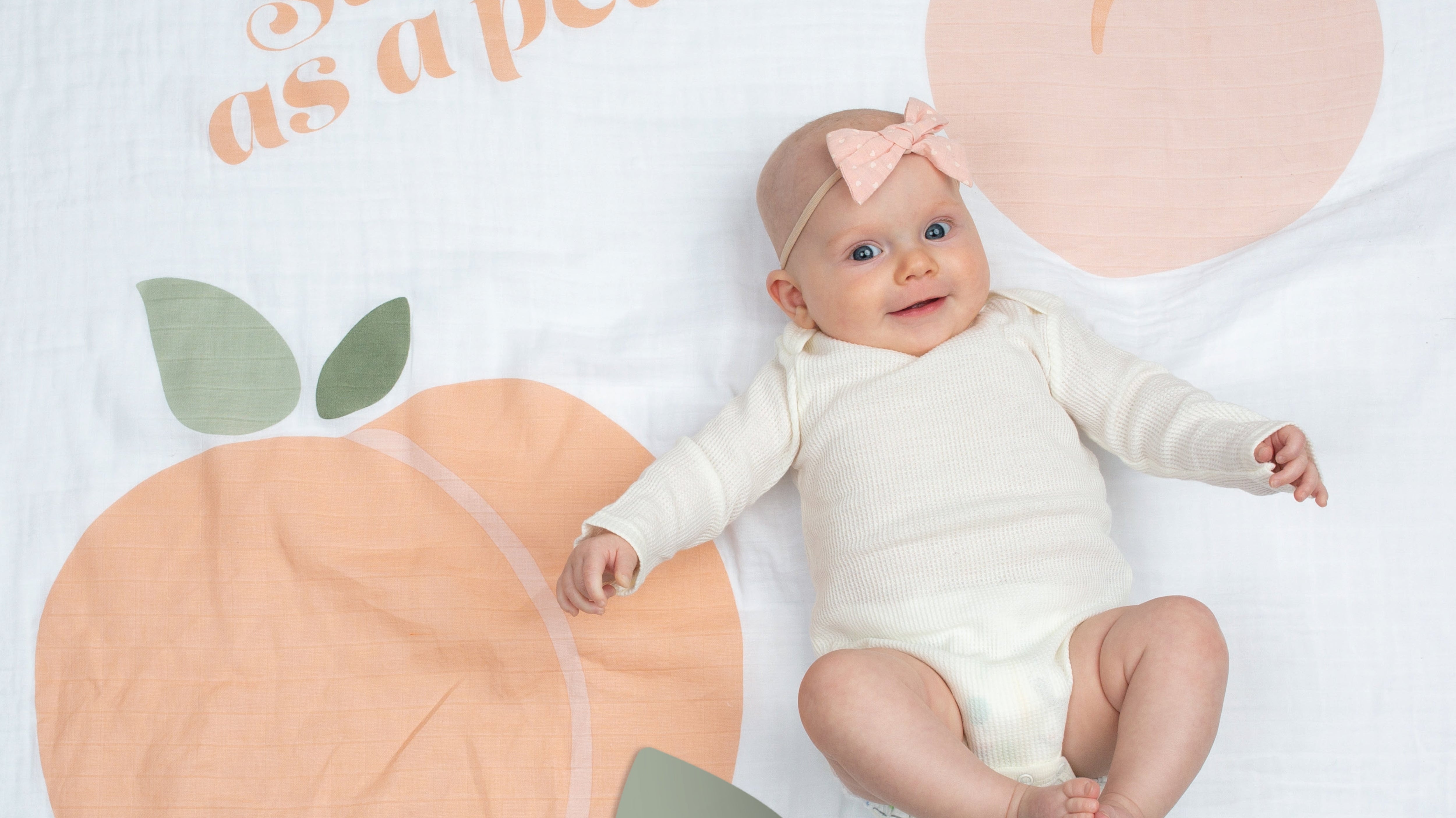 Creative Monthly Photo Ideas Using Your Baby's Milestone Blanket