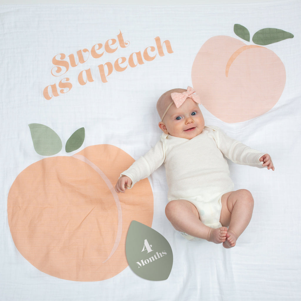 Creative Baby Photo Ideas Using Milestone Blankets
