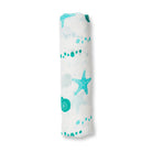 Rolled-up swaddle blanket with sea-themed design