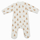 Baby onesie with teddy bear pattern on a white background